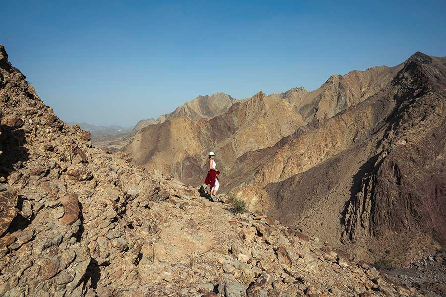 woman trekking hatta mountain trails