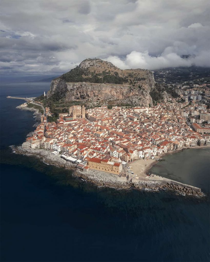 drone shot of cefalu town in sicily