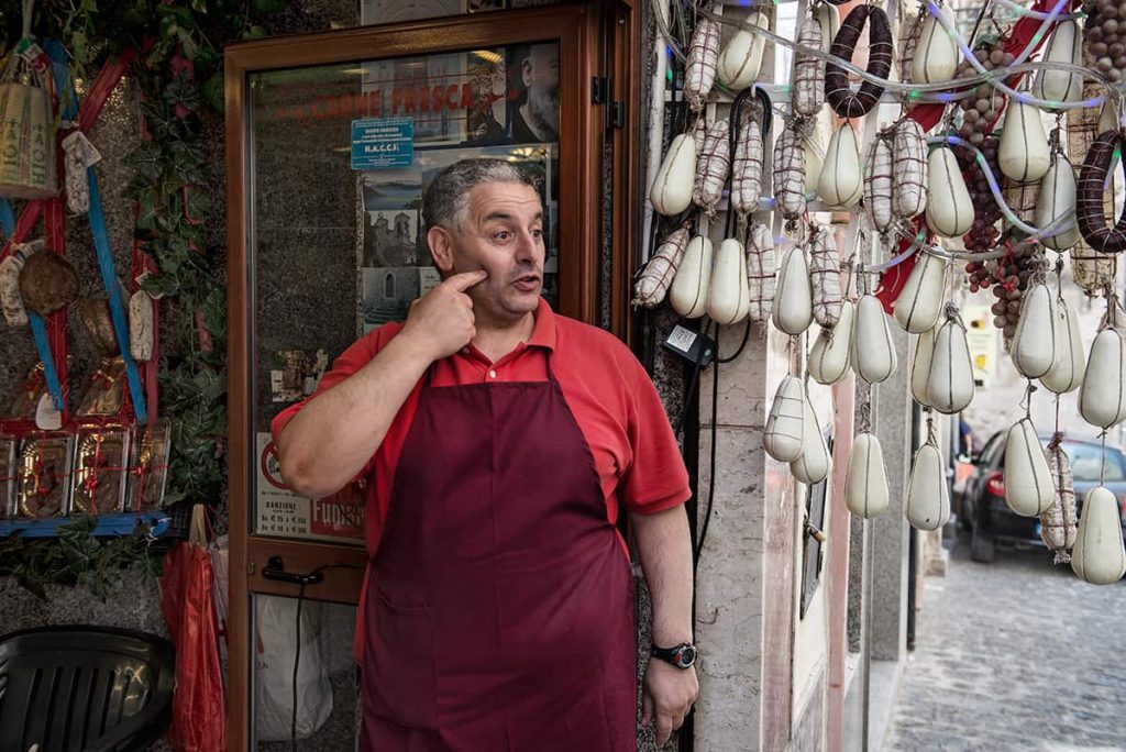 a meet shop vendor in sicily village