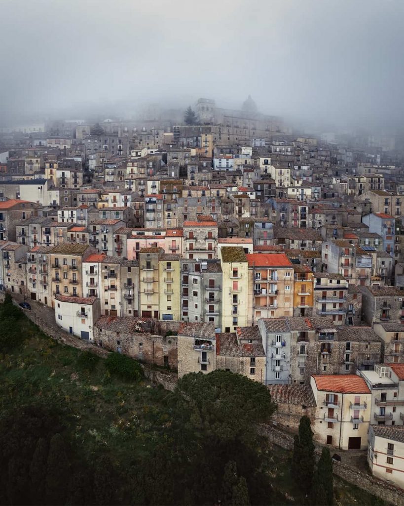 medieval mountain town aerial shot in sicily