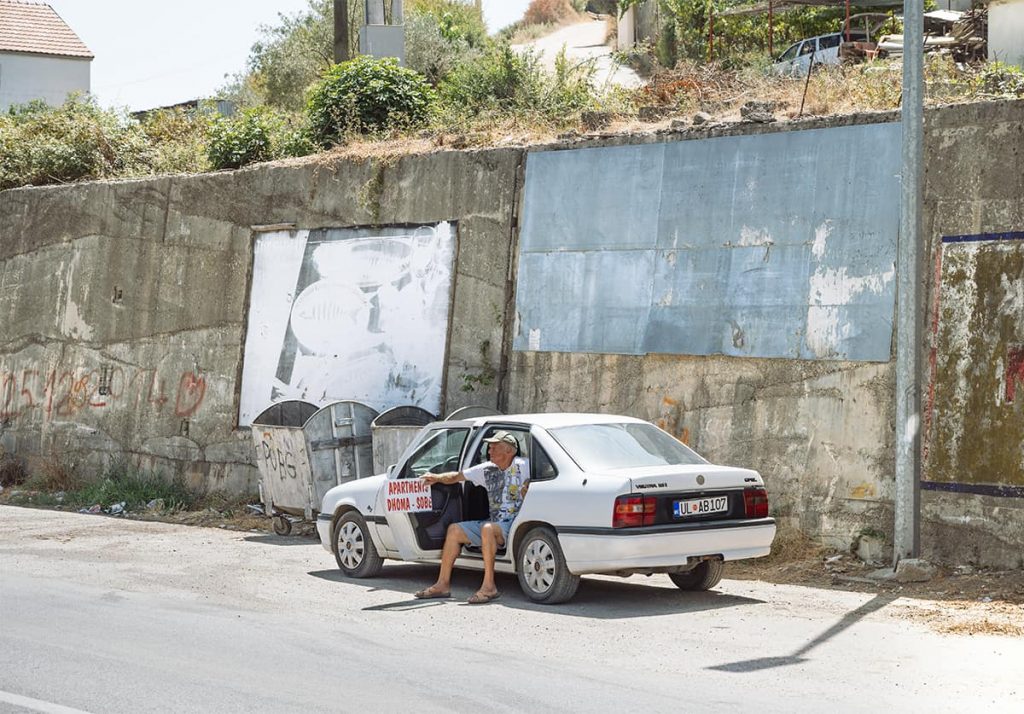 a man in Montenegro renting apartments for vacation on the street