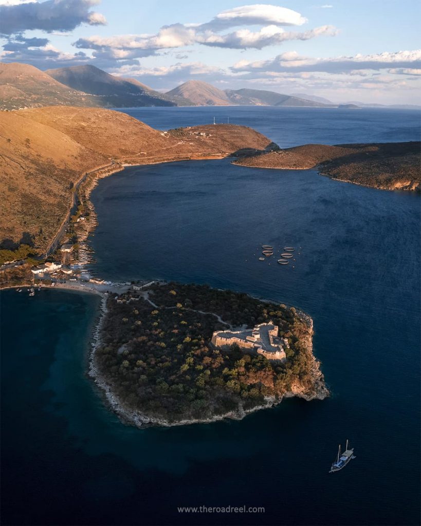 albania itinerary- albanian riviera-porto palermo drone shot at sunset