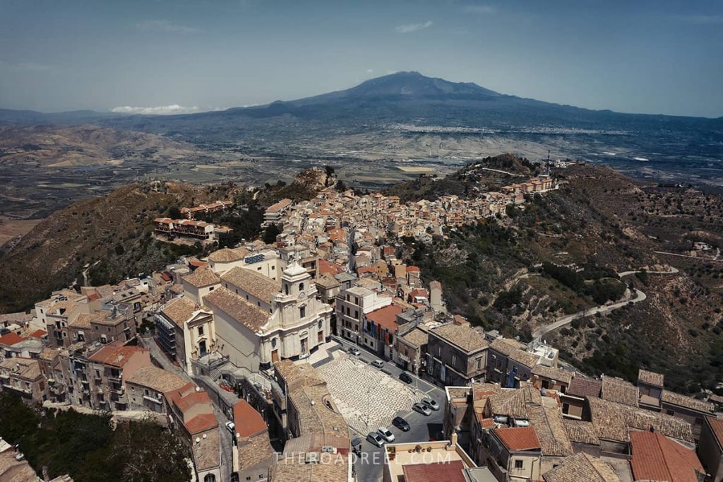 Aerial view of Centuripe with Etna volcano on the horizon
