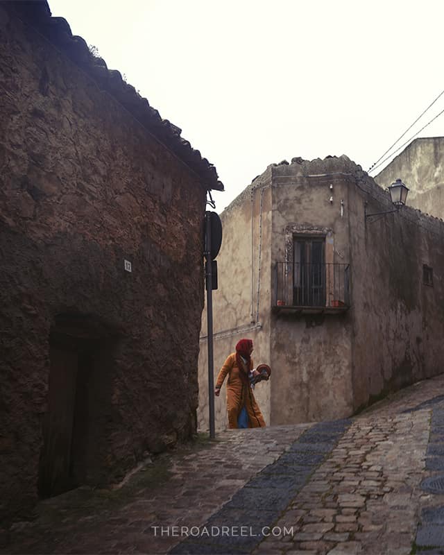 A Guide to Visiting Gangi Mountain Town in Sicily. Best things to do in Gangi, women wandering streets of Gangi