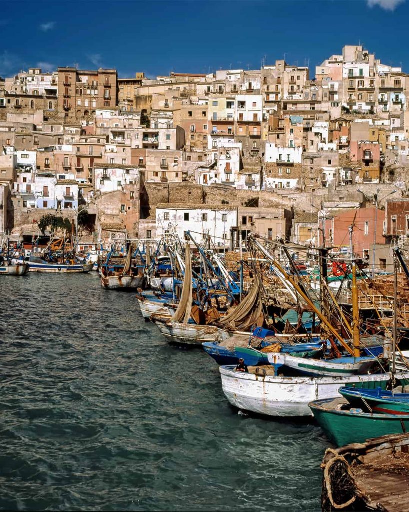 Sciacca is one of the most beautiful seaside towns in Sicily with many colorful boats