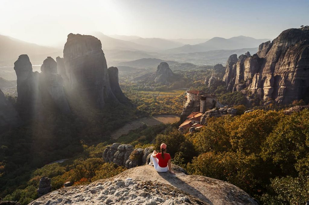 sunset rock view over meteora valley is ne pf the best photo spots in meteora