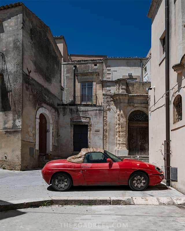 old red car in ragusa ibla