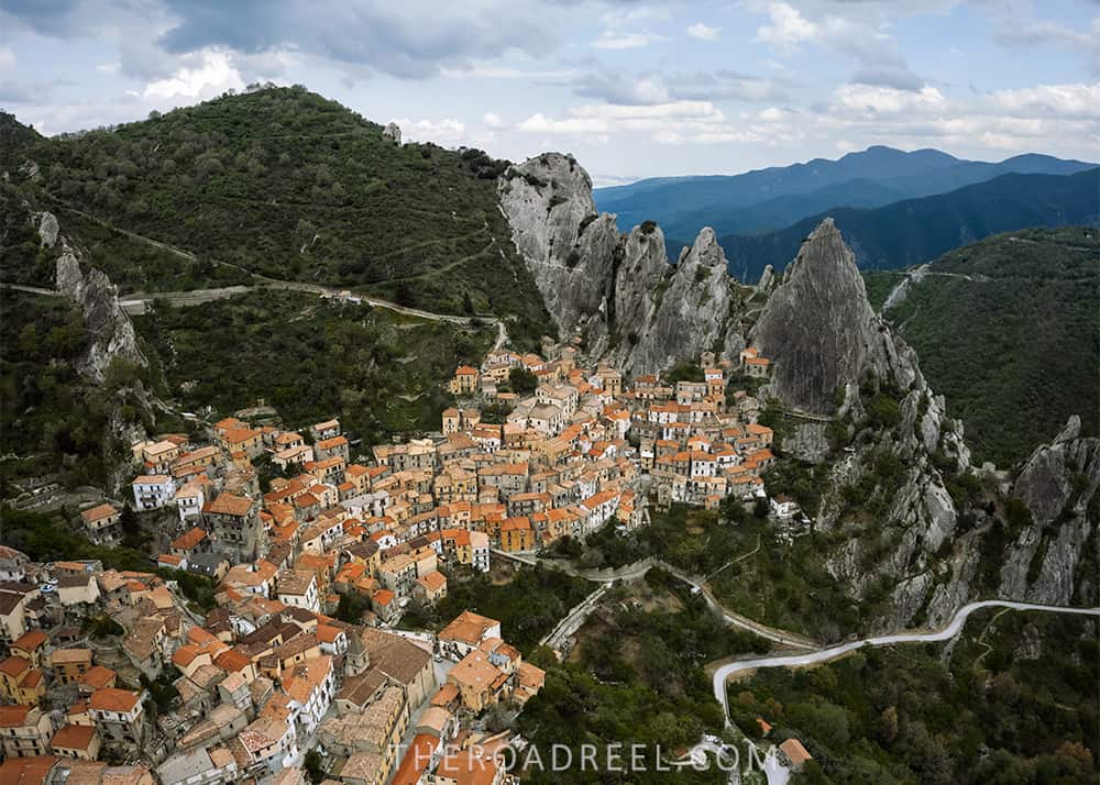 things to do in castelmezzano basilicata italy- south italy itinerary- drone image of castelmezzano on a cloudy day