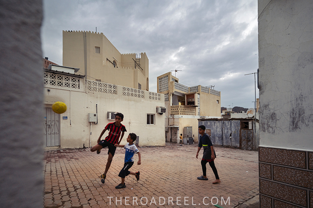 Kids playing football in Muttrah- Muscat Itinerary, Oman