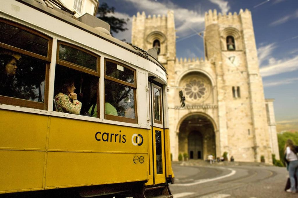 Tram 28 and Lisbon Cathedral (Sé de Lisboa) in the background