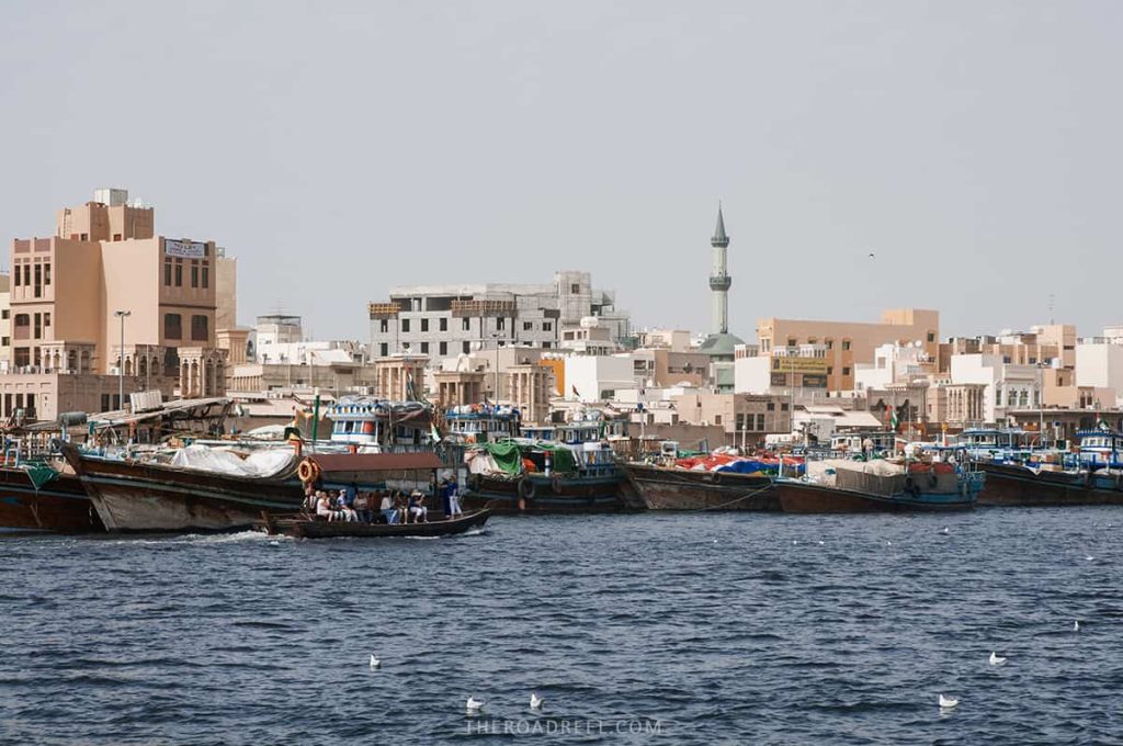 Crossing Dubai Creek in wooden abra boat is one of the most authentic things to do in Dubai