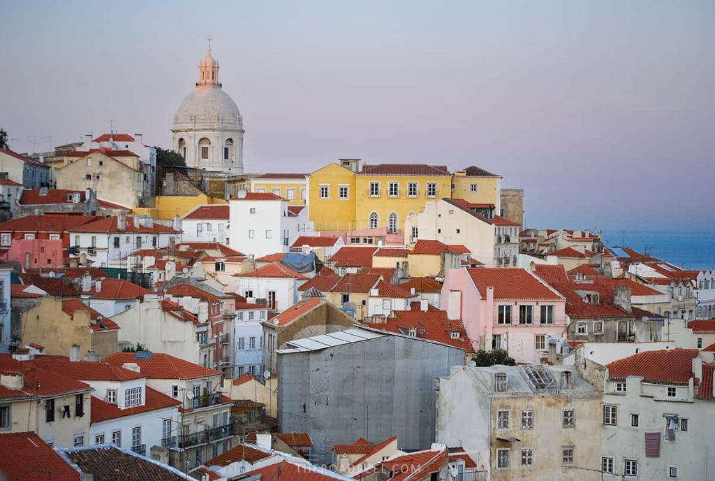 Largo dos Portas do Sol viewpoint in Lisbon at dusk