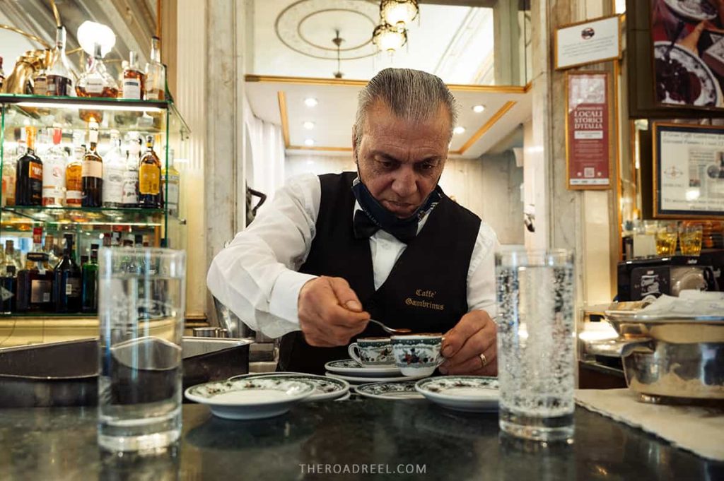 2 days in naples itinerary- cafe gambrinus barista is making espresso