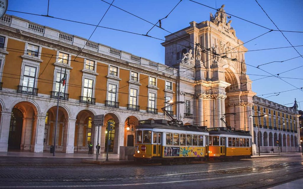 The Commerce Square (Praça do Comércio) at dusk, is a must-visit in Lisbon on a day, 