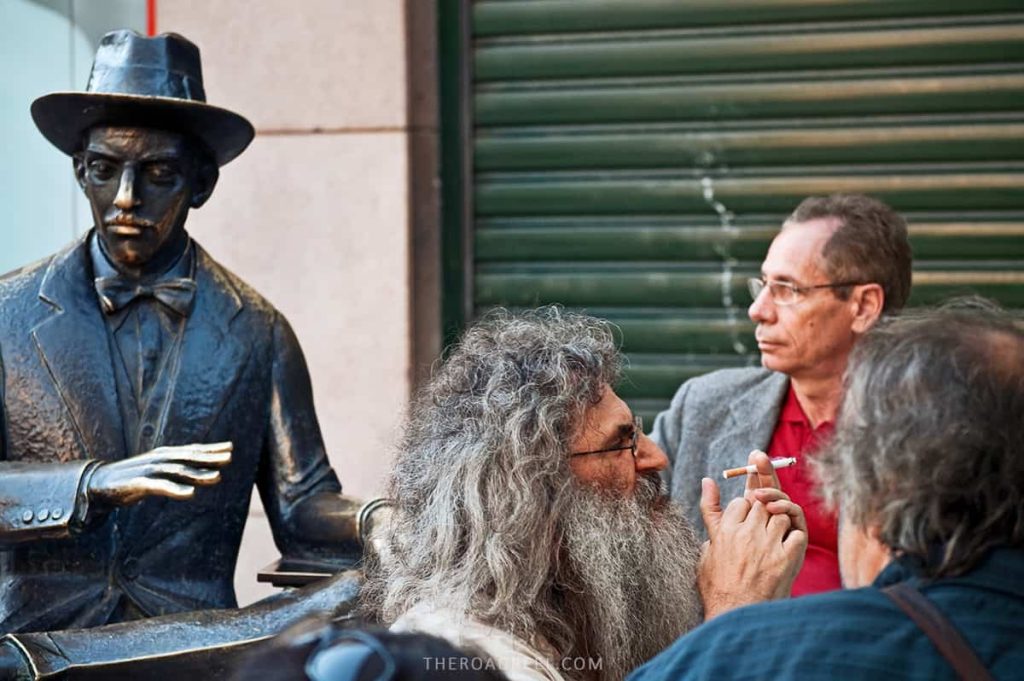 Bronze sculpture of the famous poet Fernando Pessoa at A Brasileira terrace