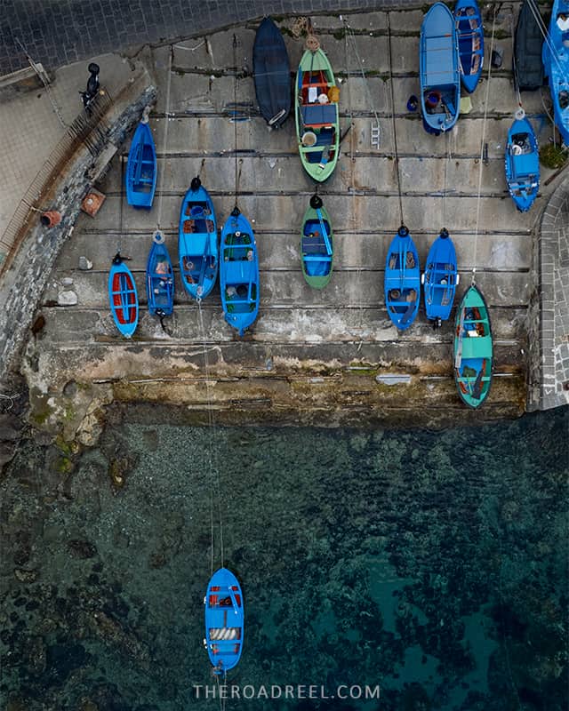 The best things to do in Scilla & Chianalea- gozzo boats parked in Chianalea