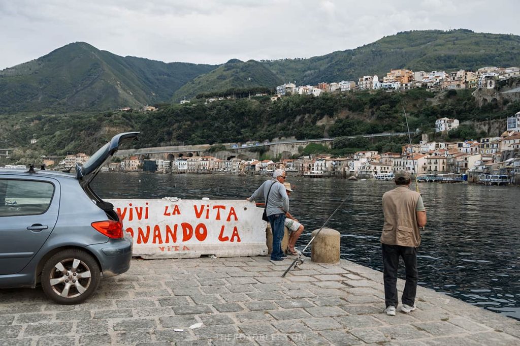 Men fishing in Scianalea, Scilla, Italy
