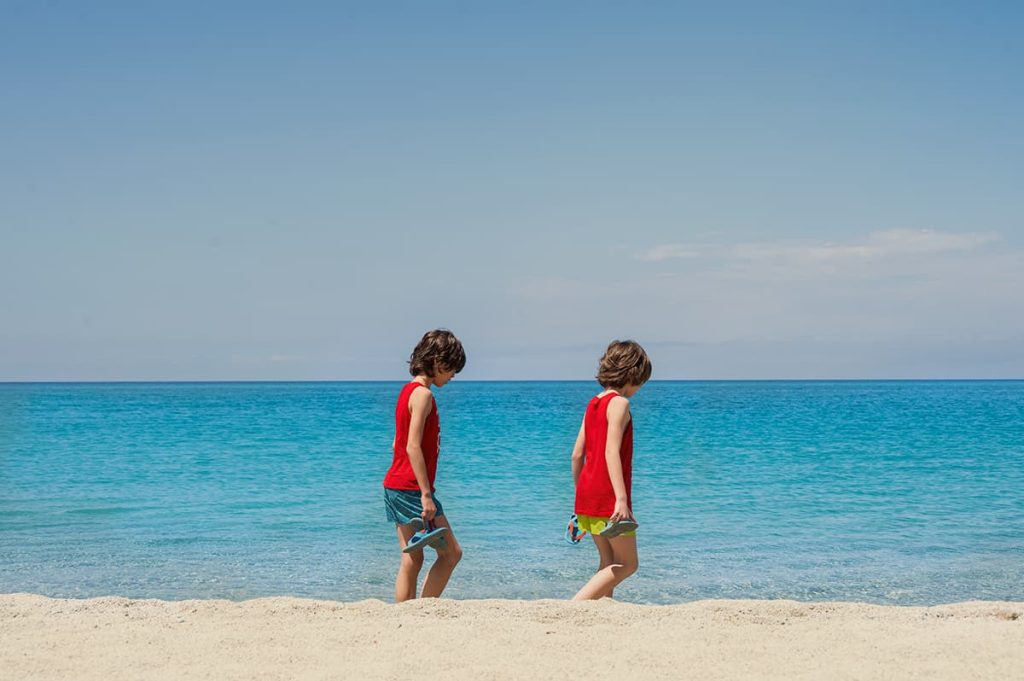 The water color is this blue in real life-best things to do in Tropea is its beaches