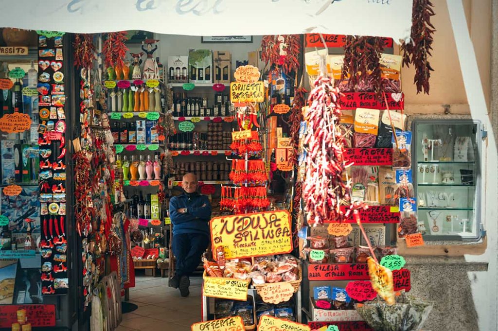 travel tips for visiting calabria- always have cash- local store selling peperoncini in Tropea