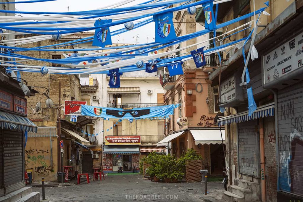 Around the corner from our accommodation in Piazza Garibaldi area, Napoli, football 2023 celebration-flags hanging on the balconies