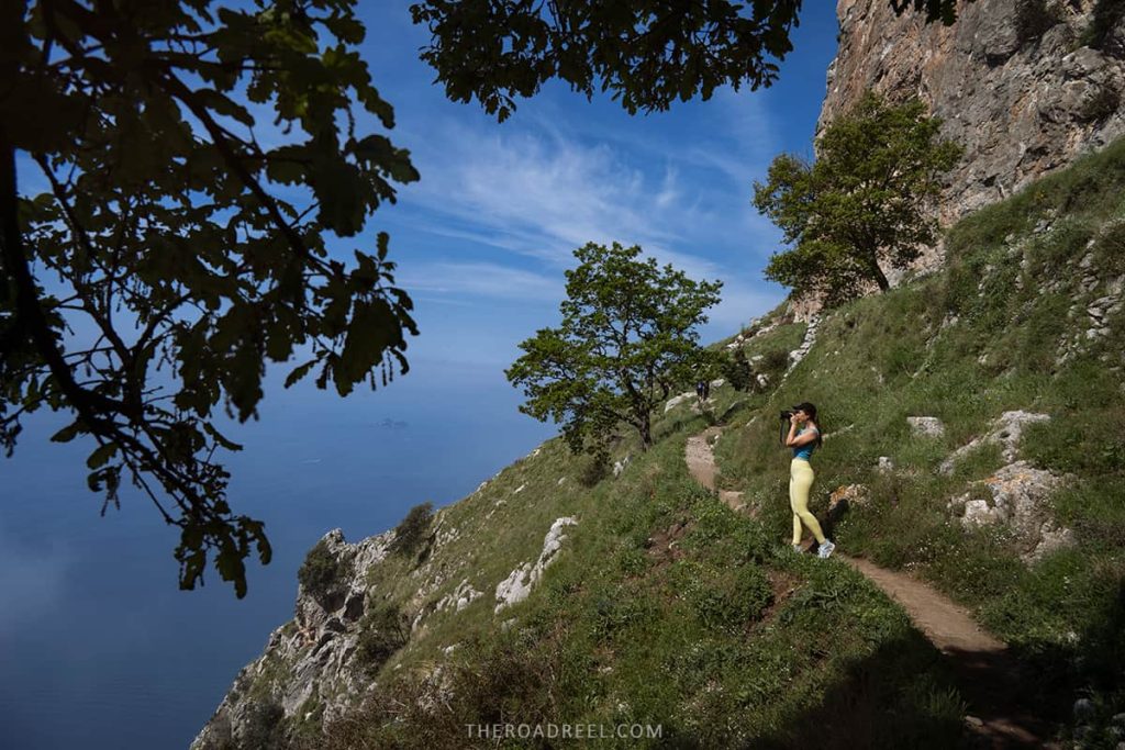 woman photographer while hiking Path fo the Gods, Amalfi Coast