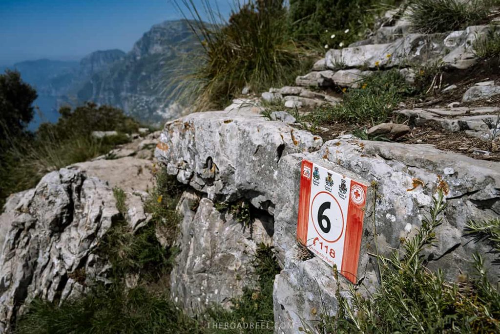 Emergency number and a location number- you can see these tiles all along the trail on path of the gods
