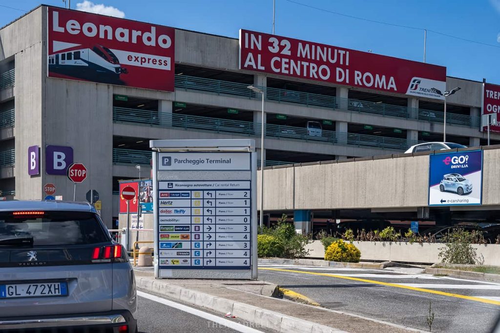 Signboard indicating parking lots for every car rental agency at Rome Fiumicino airport