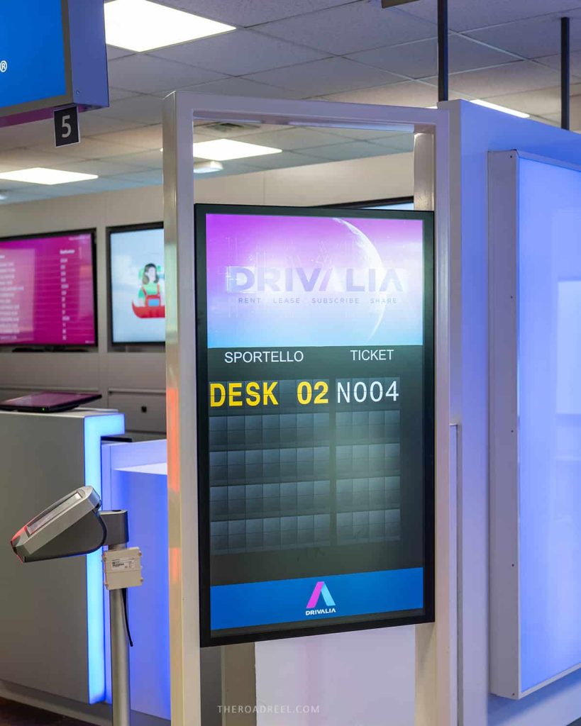 Drivalia rental desk- ticket screen- renting a car in rome
