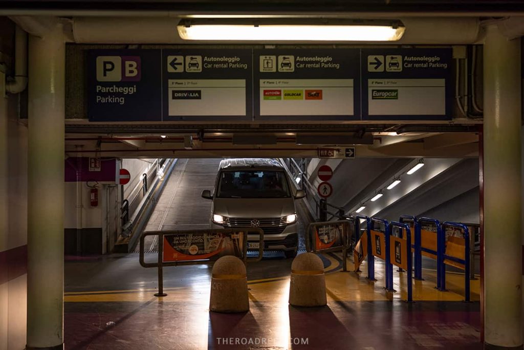 Exiting the parking lot in Rome Fiumicino Airport with a rental car