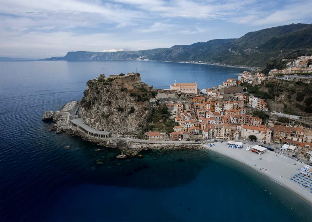 Scilla, one of the best coastal towns in Calabria Italy, castello rufollo and Scilla beach from drone