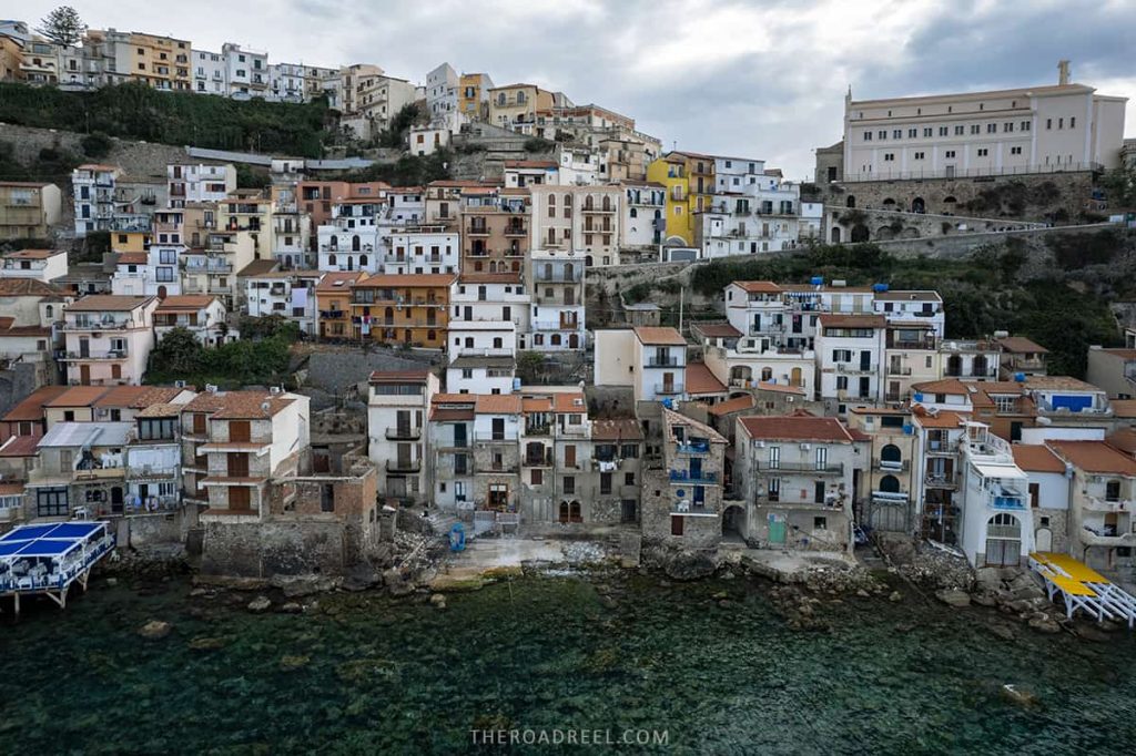 scilla and chianalea fishing village in Calabria, colorful old stone houses cascading down into the sea