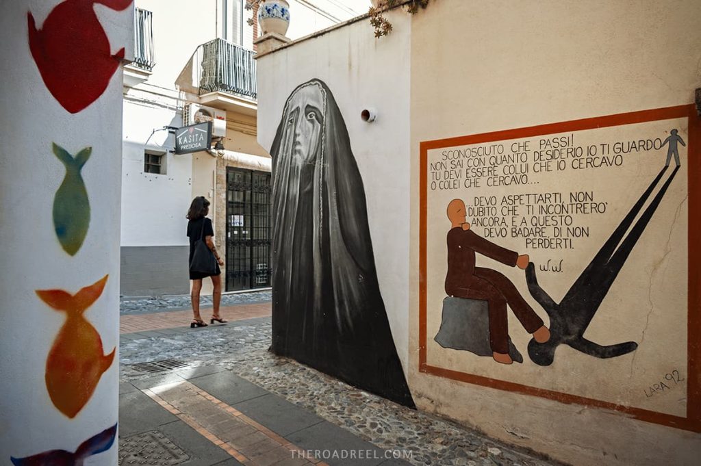 murals in diamante, Calabria depicting woman with a veil