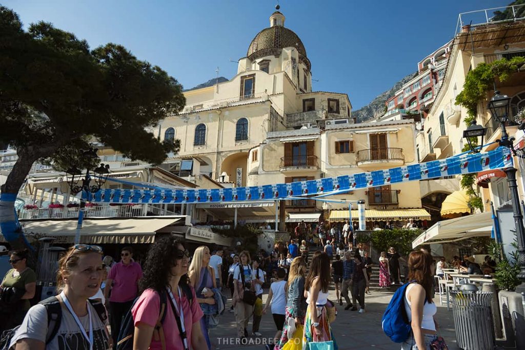 is positano worth visiting? tourists in positano