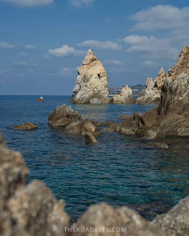 Spiaggia di Michelino beach with beautiful sharp rock formations and turquoise sea, located in Parghelia, Calabria