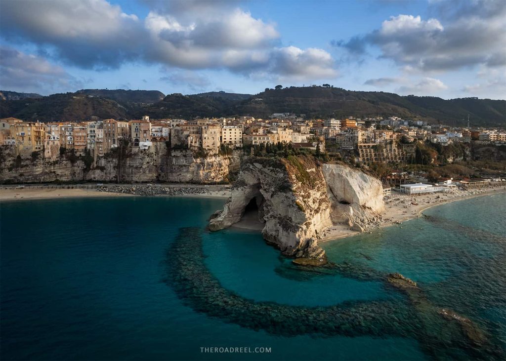 tropea beach town in calabria from drown at sunset showing town from sea persepctive